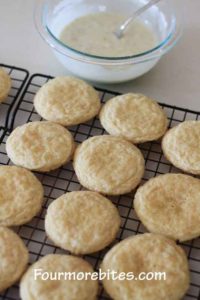 Lime sugar cookies on a wire cooling rack ready to be glazed