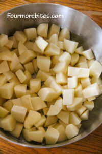 Cubed potatoes in a pot