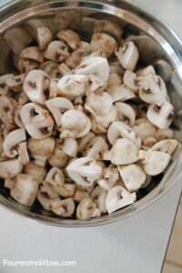 Mushrooms in a stainless steel bowl